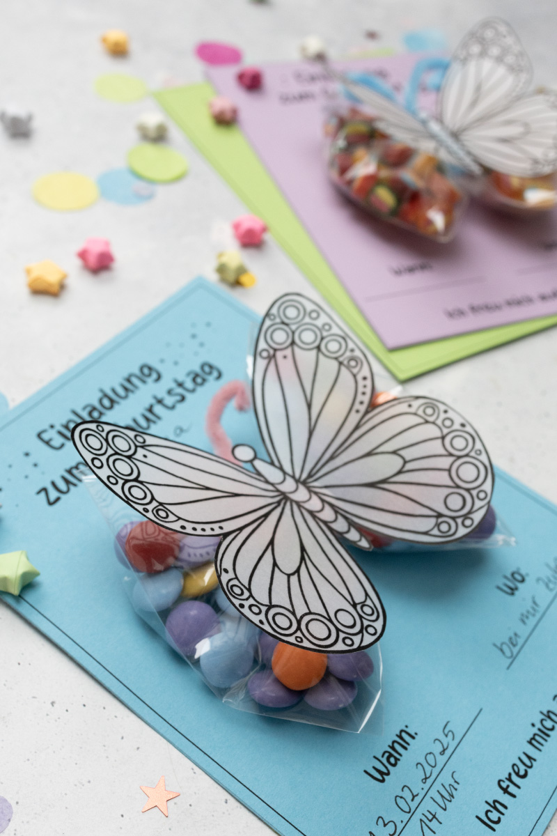 Crafts the invitation card with candy butterflies for the children's birthday party 