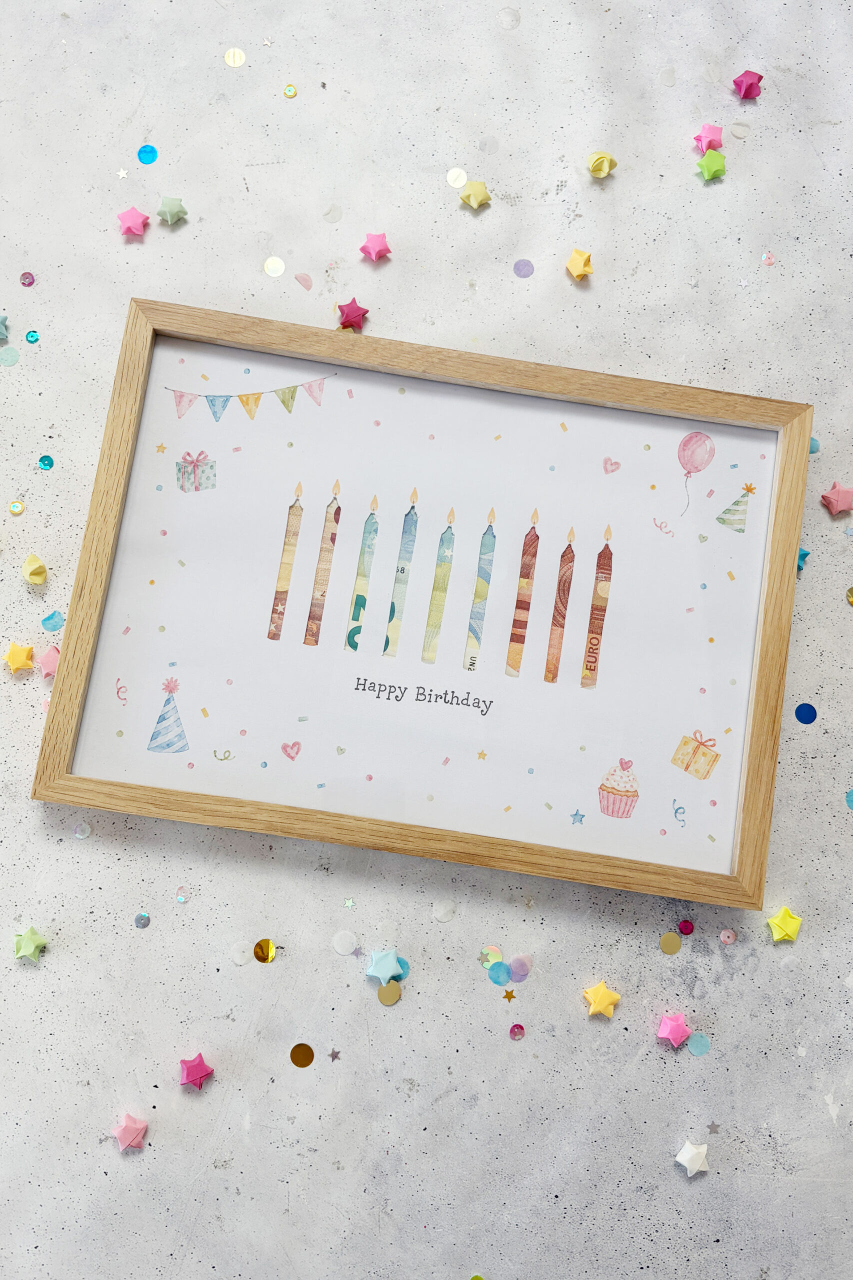Geldgeschenk zum Geburtstag mit Geburtstagskerzen