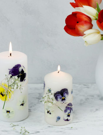 Kerzen mit getrockneten Blumen verzieren