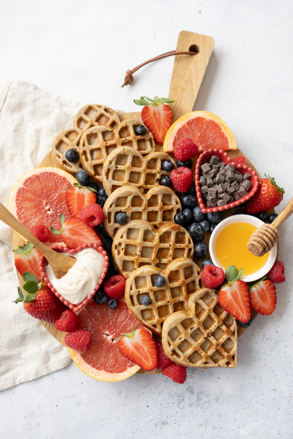Brunch board with heart waffles for Mother's Day